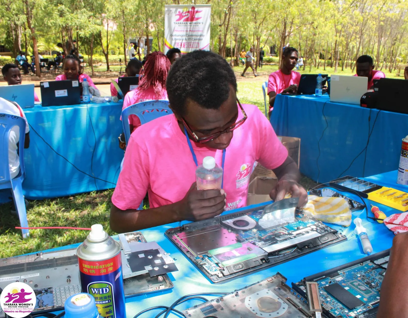 WaylerTech repair clinic: laptop disassembly outdoors